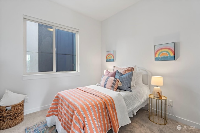 bedroom featuring carpet