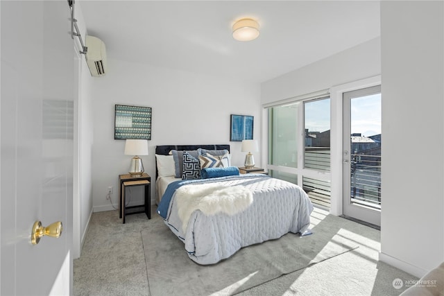 carpeted bedroom with an AC wall unit and access to outside