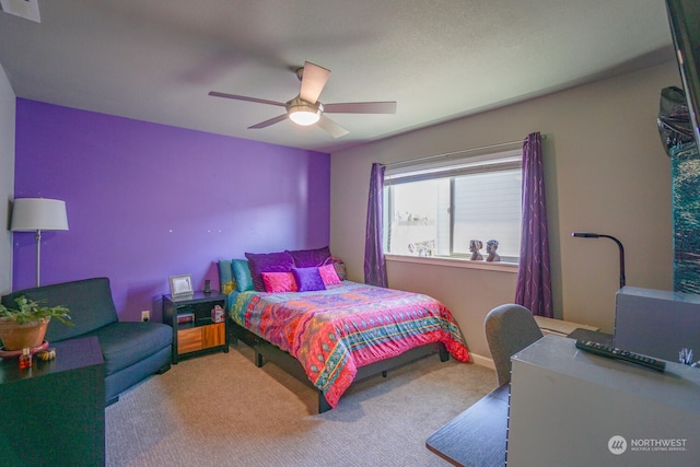 carpeted bedroom with ceiling fan