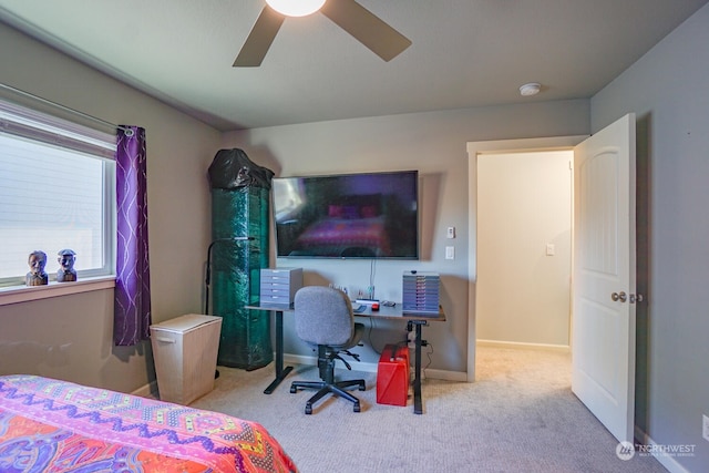 bedroom with light carpet and ceiling fan