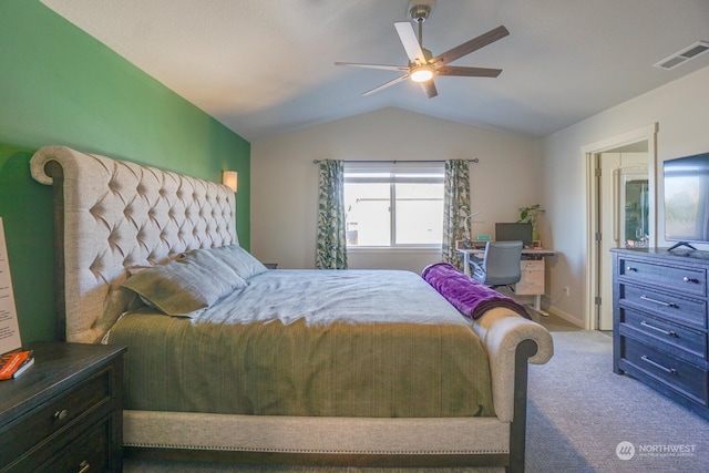 carpeted bedroom with ceiling fan and lofted ceiling