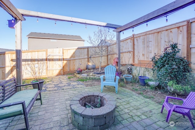 view of patio / terrace featuring a fire pit