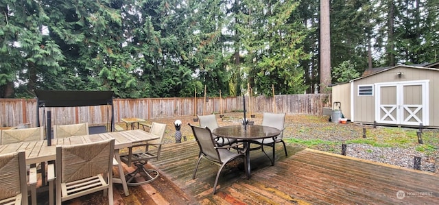 deck featuring a storage shed