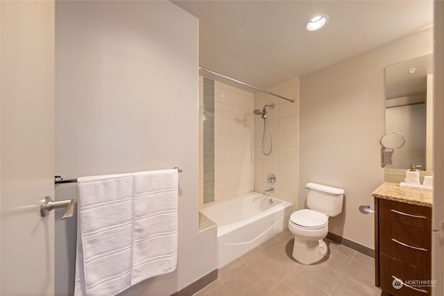 full bathroom with vanity, toilet, tiled shower / bath combo, and tile patterned flooring