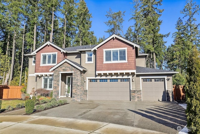 craftsman inspired home featuring a garage