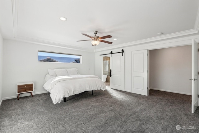 carpeted bedroom with crown molding, a barn door, and ceiling fan