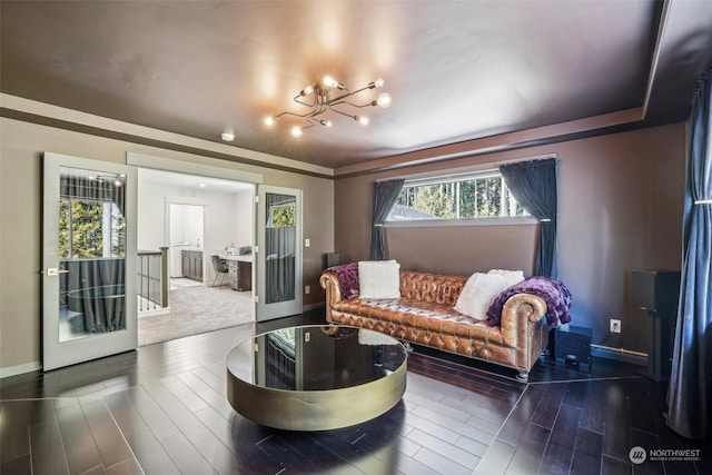 living room featuring an inviting chandelier