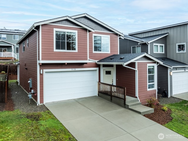 view of front of home featuring a garage and concrete driveway