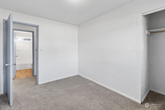 unfurnished bedroom featuring carpet