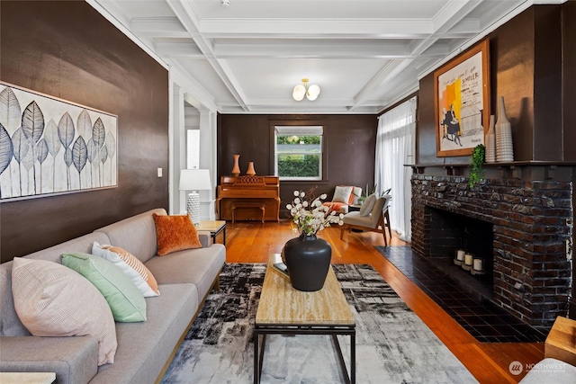 living room featuring beam ceiling, wood finished floors, and coffered ceiling