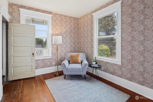 sitting room featuring a wealth of natural light, baseboards, hardwood / wood-style floors, and wallpapered walls