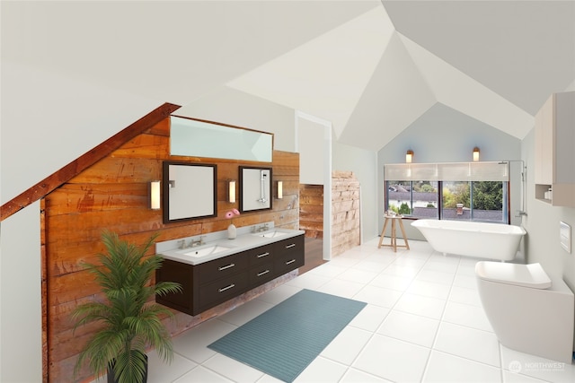 full bath with double vanity, a freestanding bath, a sink, vaulted ceiling, and tile patterned floors