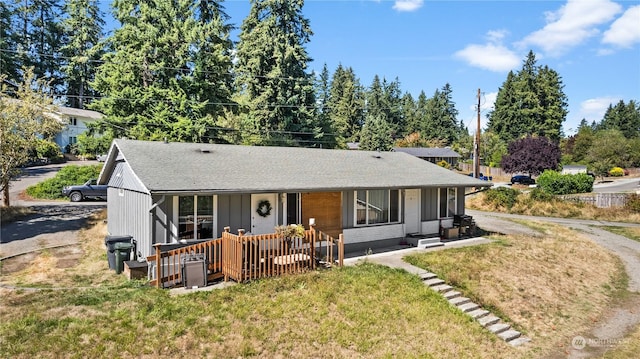 view of front of house with a front lawn and covered porch