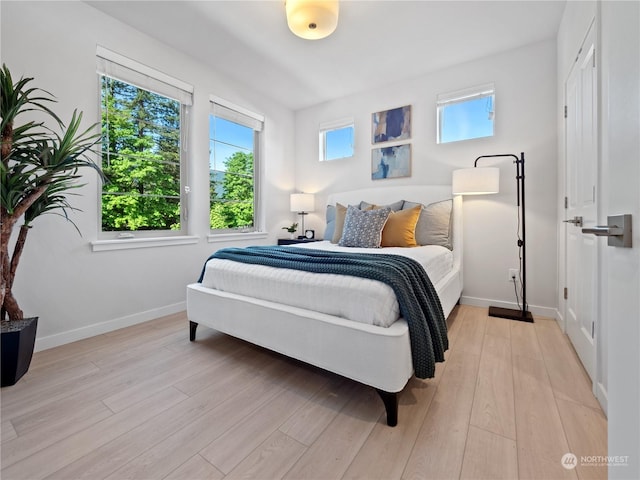 bedroom featuring light hardwood / wood-style floors