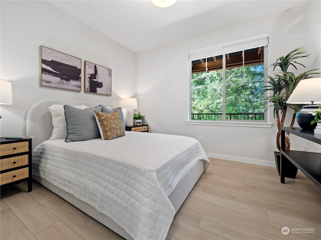 bedroom featuring light hardwood / wood-style floors