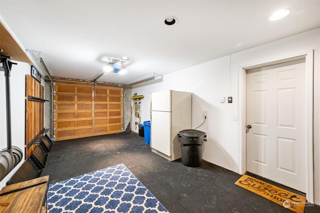 garage with white refrigerator