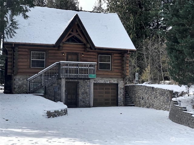 log cabin with a garage