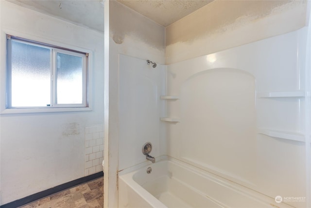 bathroom featuring shower / bath combination