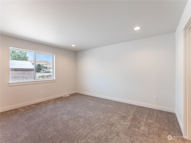 empty room featuring carpet