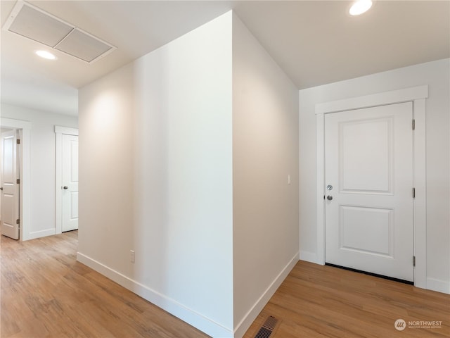 hallway featuring light hardwood / wood-style floors