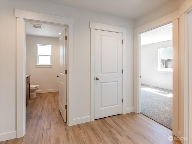 hallway featuring light hardwood / wood-style floors