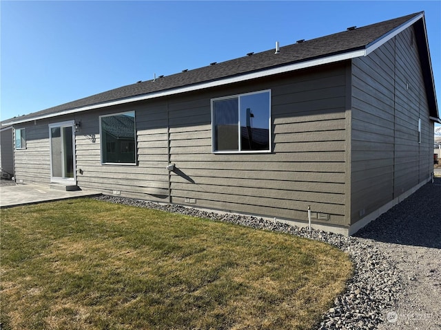 exterior space with a yard and a patio