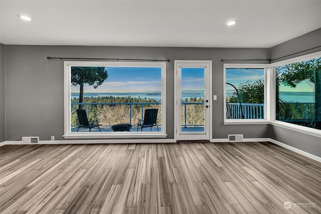 spare room featuring hardwood / wood-style floors