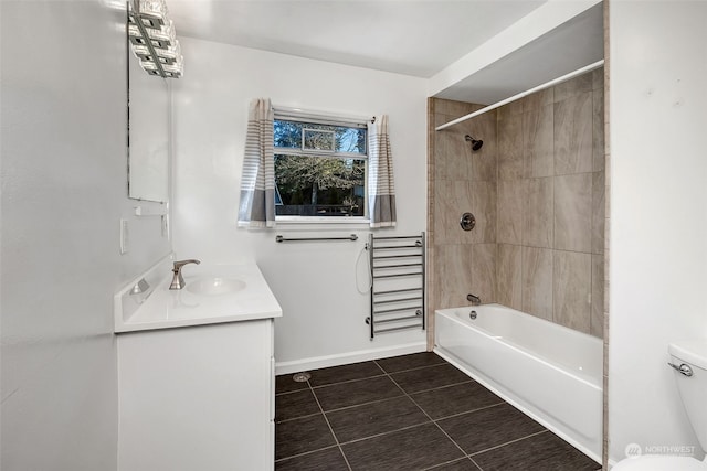 full bathroom featuring radiator, tiled shower / bath combo, vanity, toilet, and tile patterned floors