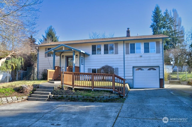 view of front of property featuring a garage