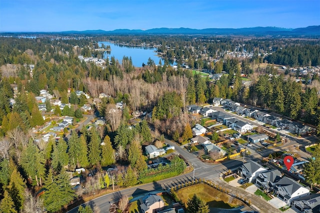 aerial view with a water and mountain view