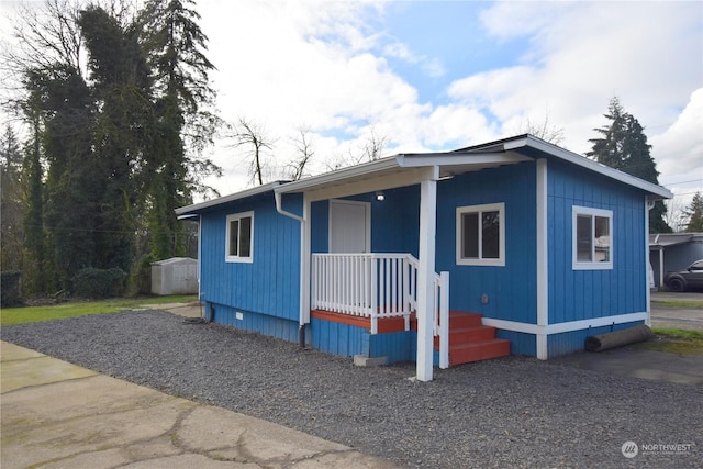 manufactured / mobile home with a shed