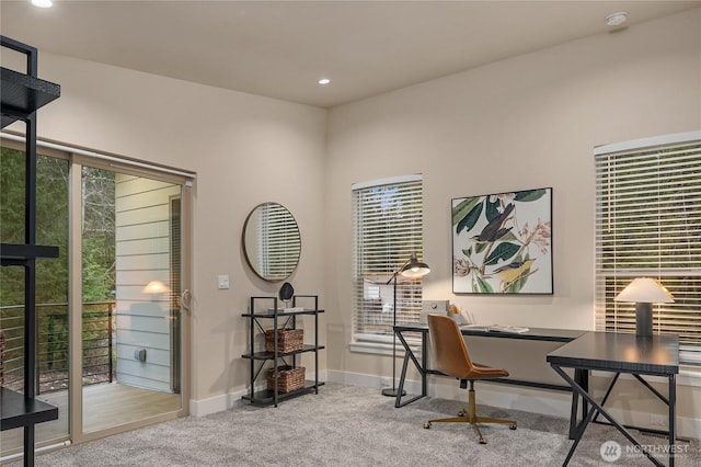 office space featuring carpet floors, recessed lighting, plenty of natural light, and baseboards