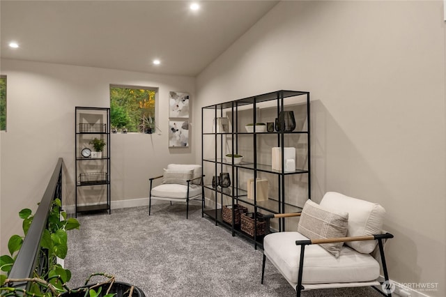 sitting room featuring baseboards, carpet flooring, and recessed lighting