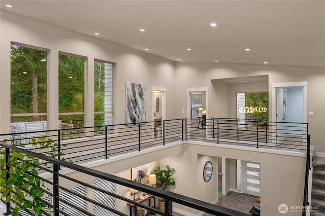 interior space featuring high vaulted ceiling and recessed lighting