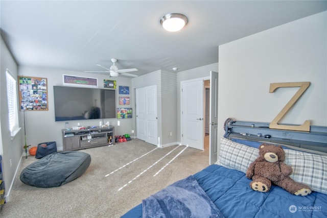 bedroom featuring ceiling fan and carpet flooring