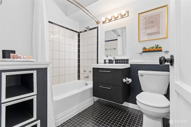 full bathroom featuring tile patterned flooring, vanity, shower / tub combo, and toilet