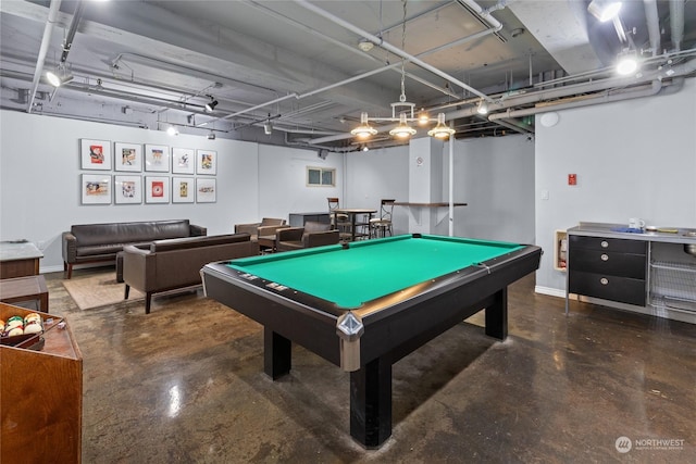 game room featuring concrete flooring and pool table