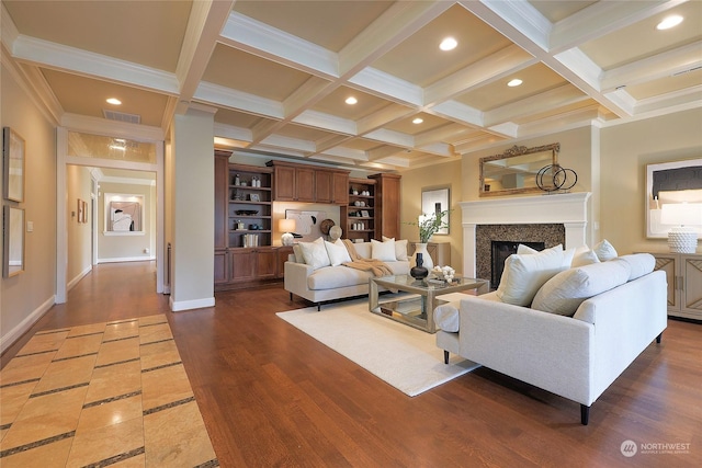 living room with coffered ceiling, beam ceiling, dark hardwood / wood-style flooring, and ornamental molding