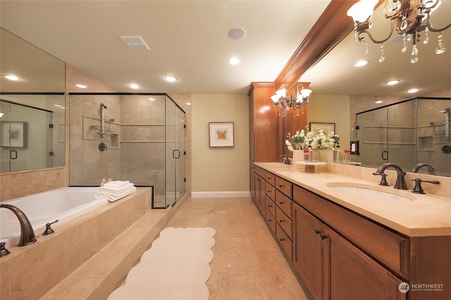 bathroom with vanity, tile patterned floors, a chandelier, and plus walk in shower