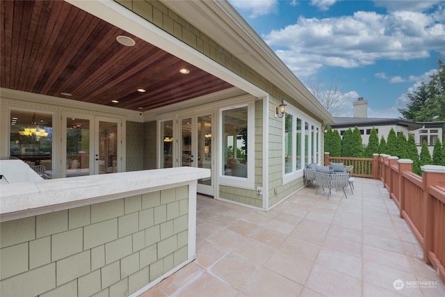 view of patio featuring french doors