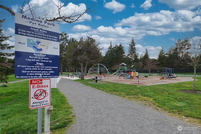 view of play area featuring a lawn