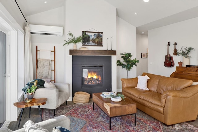 living room featuring a tile fireplace, vaulted ceiling, and a wall mounted AC