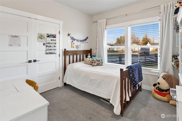 bedroom featuring carpet