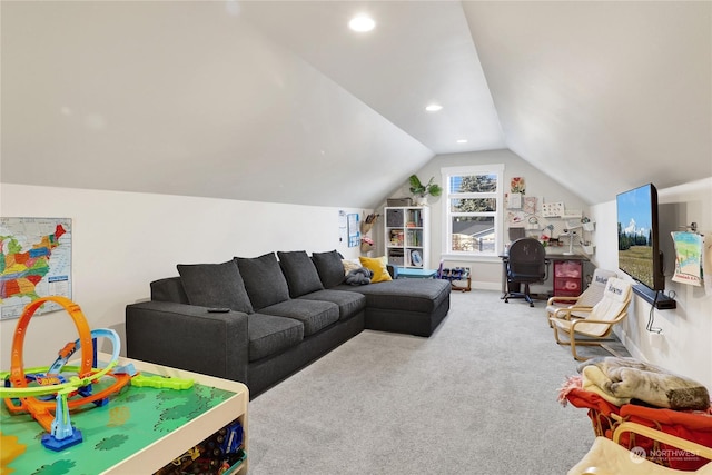 living room with vaulted ceiling and carpet flooring