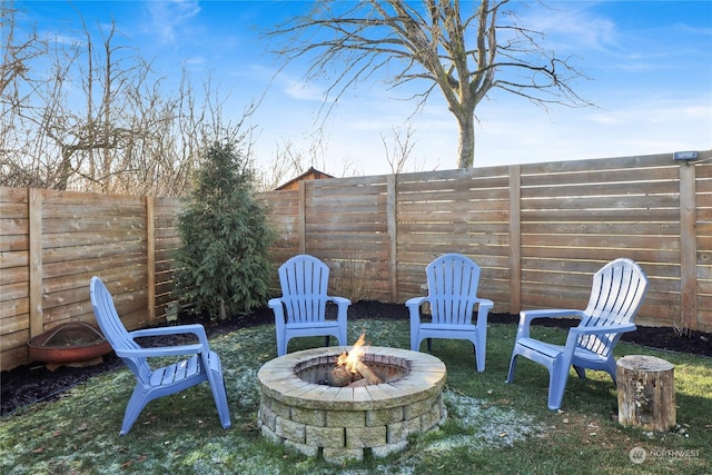 view of patio / terrace featuring a fire pit