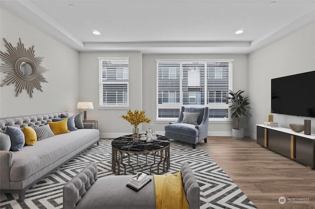 living room with hardwood / wood-style flooring and plenty of natural light