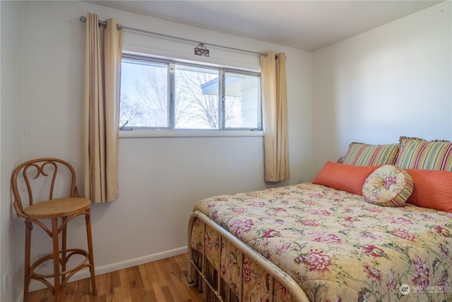 bedroom featuring hardwood / wood-style floors