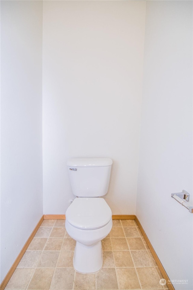 bathroom featuring toilet