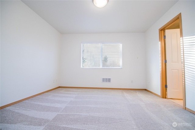 unfurnished bedroom with light carpet