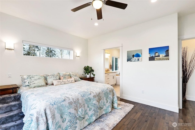 bedroom featuring ceiling fan, ensuite bathroom, and dark hardwood / wood-style flooring